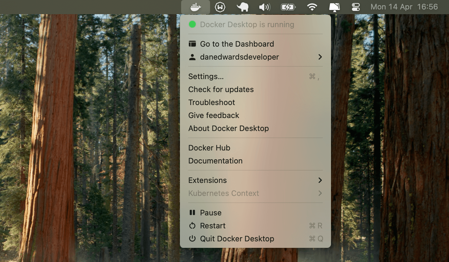 Docker Desktop dropdown menu showing options including Dashboard, Settings, and user profile.